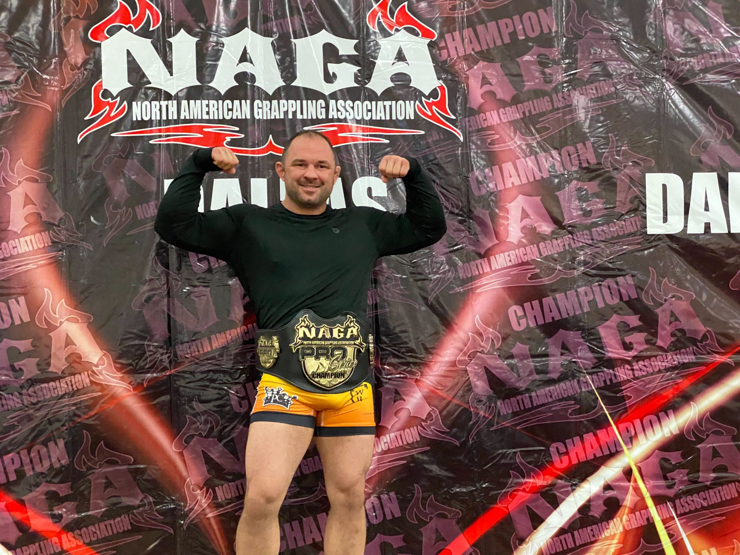 Professor Charley of Aces Jiu Jitsu Club wins the NAGA Dallas Belt Professor Charley of Aces BJJ Club wins the NAGA Dallas Belt